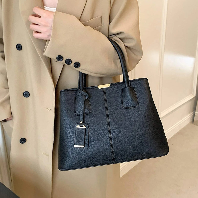 Sac à main large bandoulière porté main