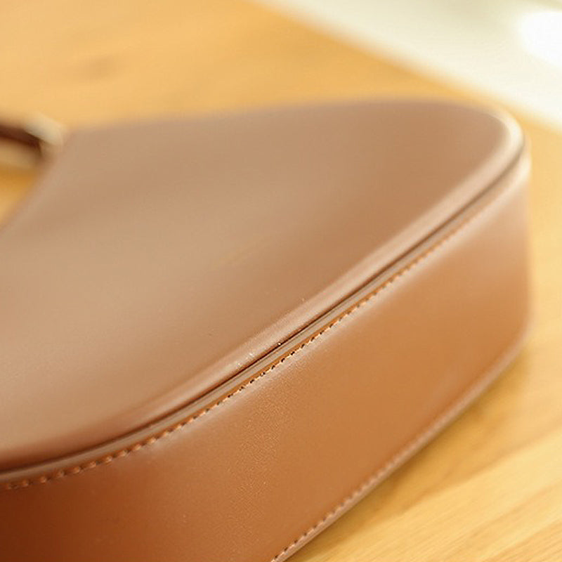 Sac à main cuir marron et rigide