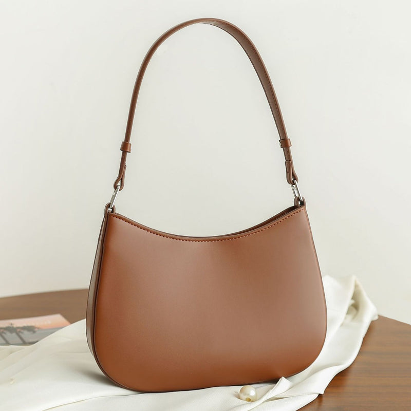 Sac à main cuir marron et rigide