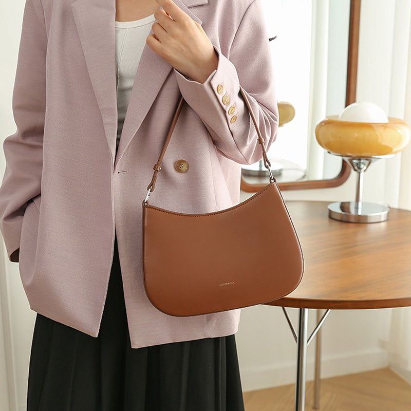 Sac à main cuir marron et rigide arrondi