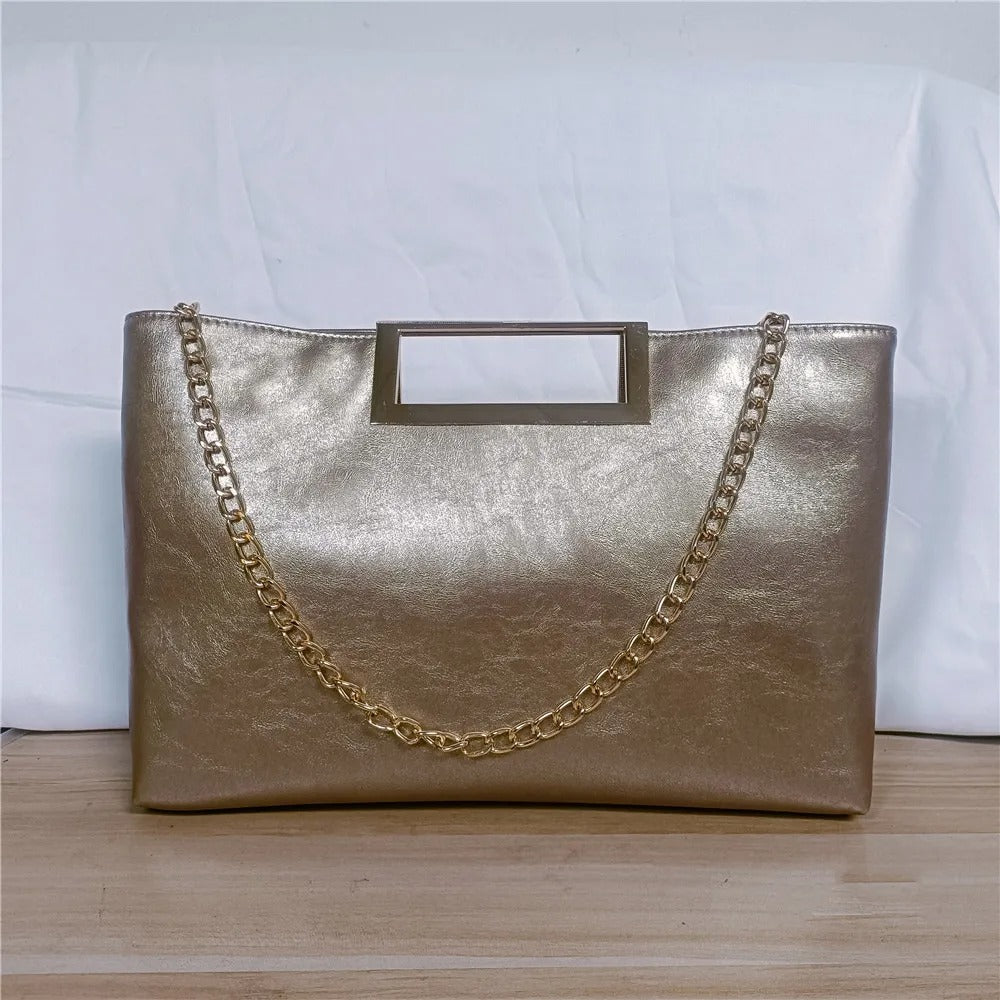 Sac à main doré pochette
