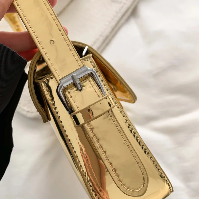 Sac à main doré bandoulière