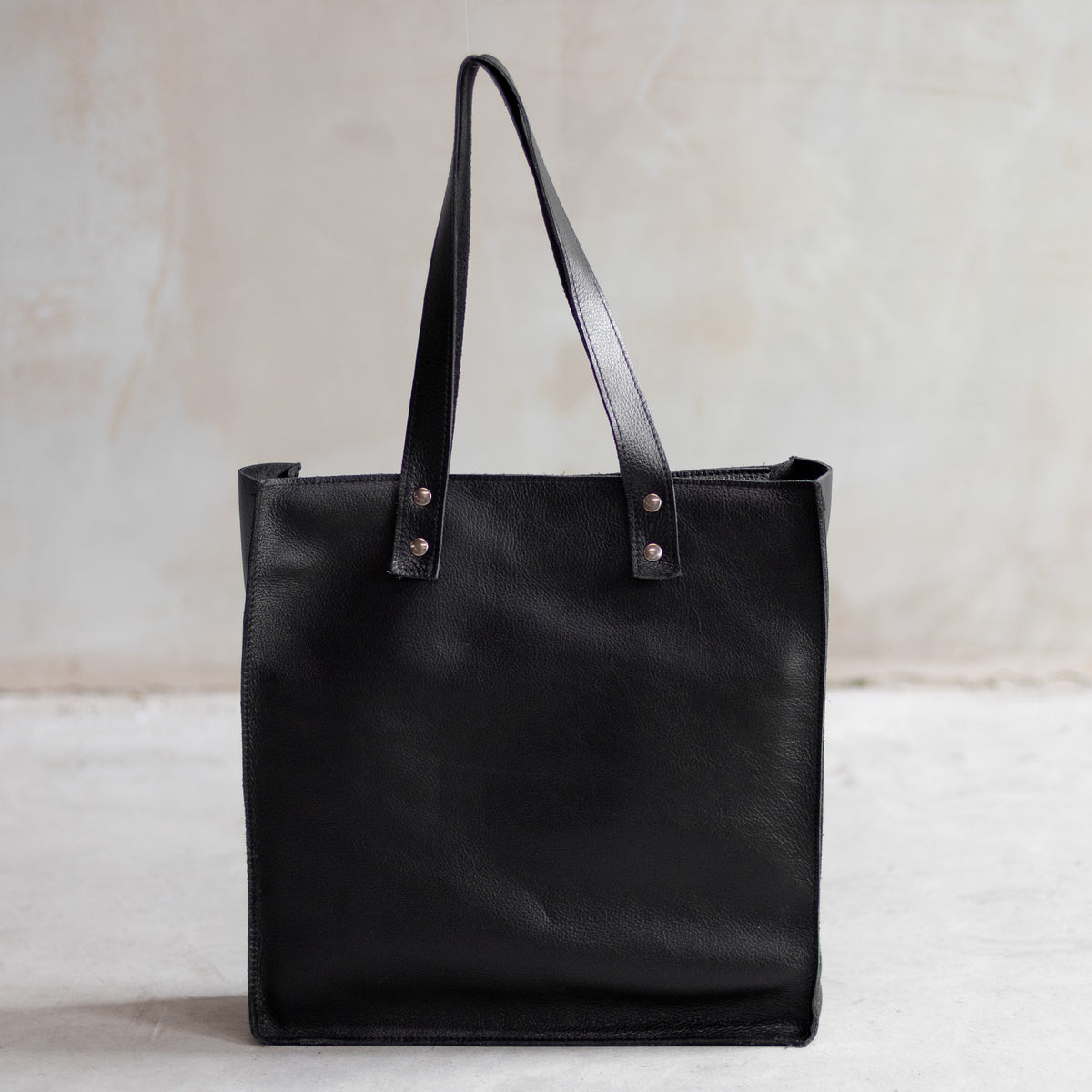 Sac à main cabas en cuir et peau de vache léopard, dos en cuir noir